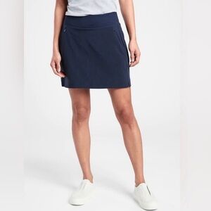 Athleta SoHo Skort  with Zipped Pockets & Built-In 5” Shorts in Navy Blue